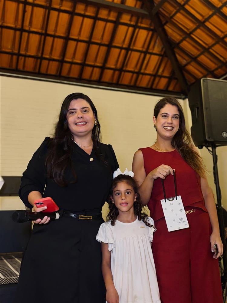 Aluna e família no recital